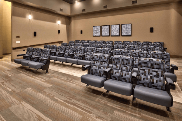 Interior of a screening room with empty seats