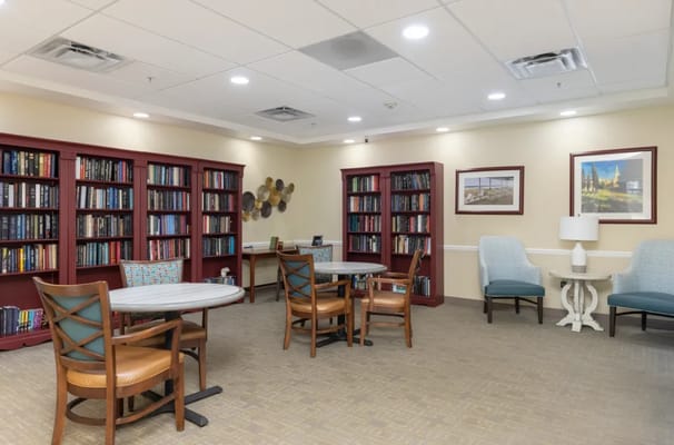 Bright interior of a common area with bookshelves