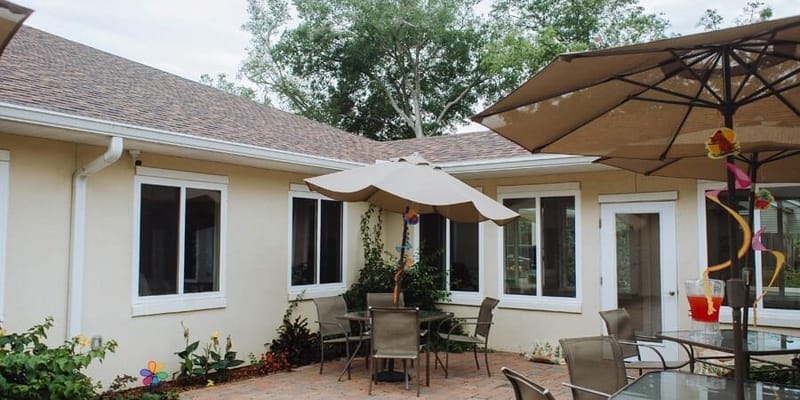 Outdoor patio with tables and umbrellas