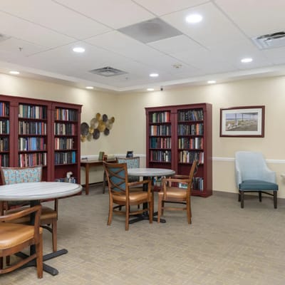 Interior common area with bookshelves and seating