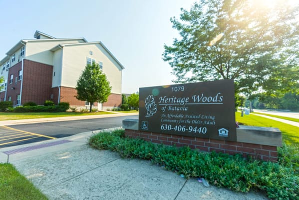 Exterior view of Heritage Woods of Batavia with signage