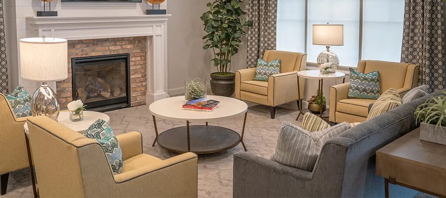 Cozy common area with seating and a fireplace