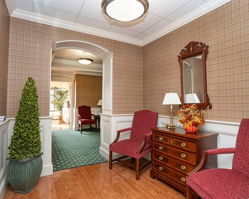 Interior hallway of a senior living facility.