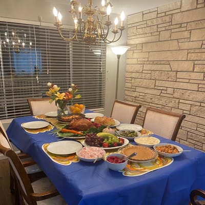 A beautifully set dining table with a variety of foods