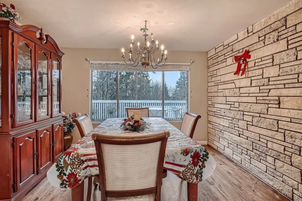 Decorative dining area with festive table setting