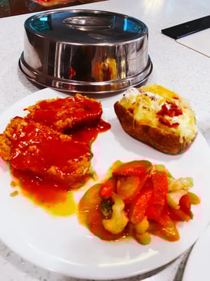 A plate of food served in a dining area
