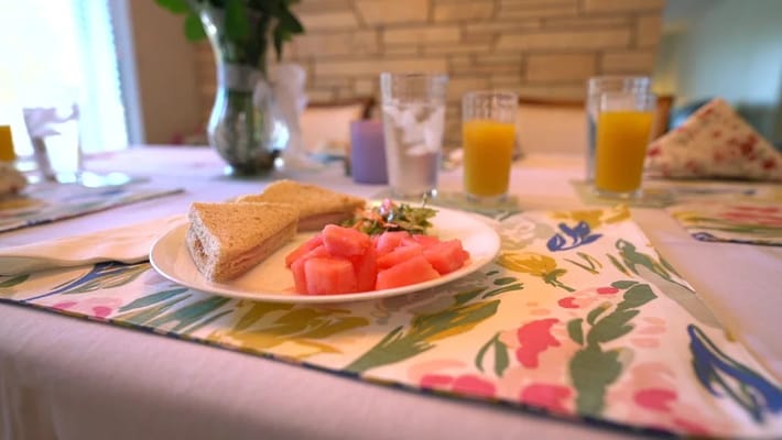 A dining table with a healthy meal setting