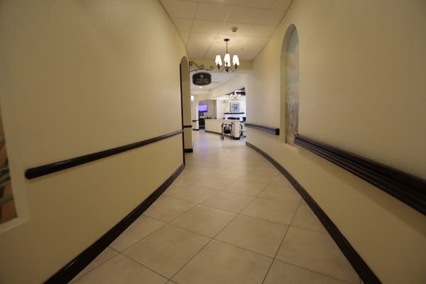 A curved hallway in Grand Living At Tamaya
