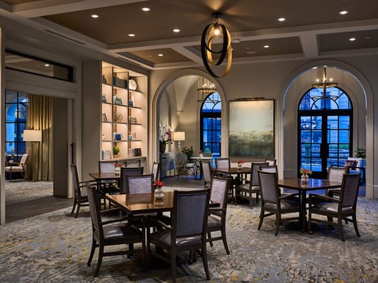 Elegant common area with tables and chairs