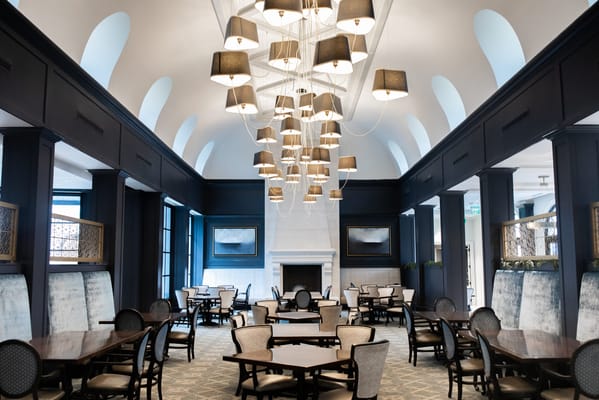 Bright dining room with elegant lighting and tables