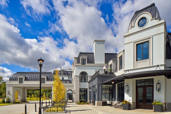 Exterior view of a senior living facility with stylish architecture