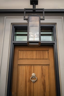 Entrance door with lantern detail