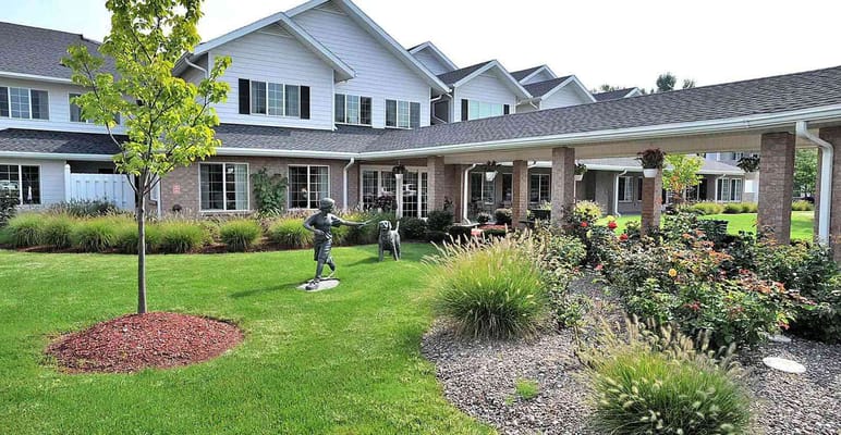Outdoor space with well-maintained garden and paths
