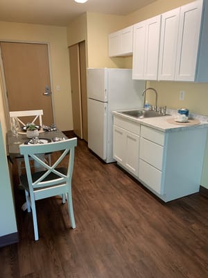 A bright kitchen space with dining area