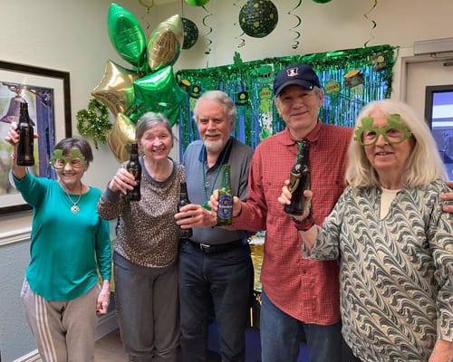 Residents enjoying a festive celebration with drinks