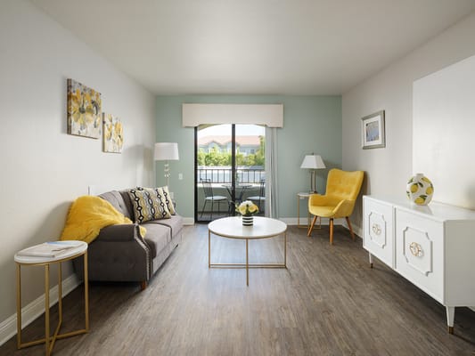 Cozy interior living area with a balcony view