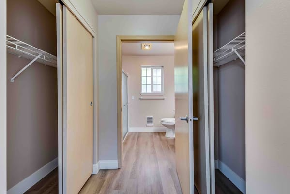 Interior view of a bathroom and closet in a resident room