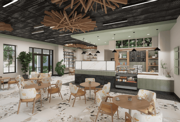 Bright dining area with tables and food display