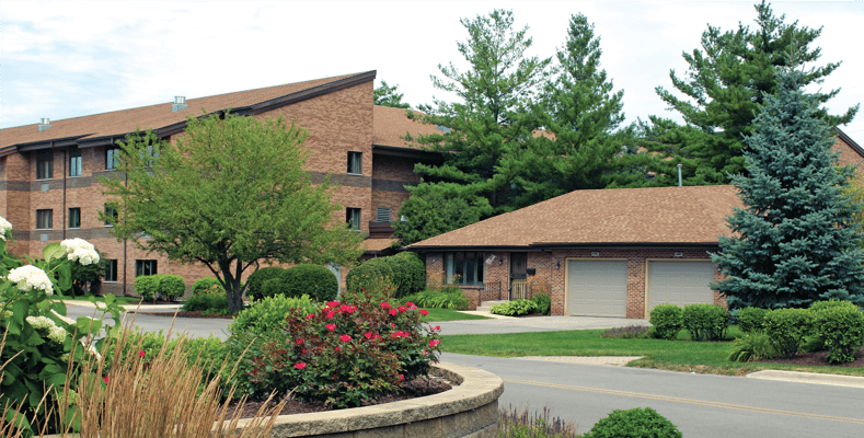 Exterior view of Siena on Brendenwood with landscaping