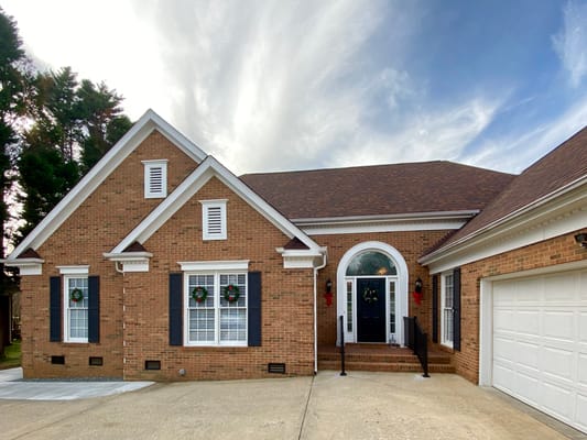 Exterior view of a senior living facility with front entrance