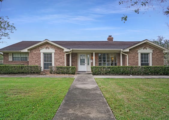 Exterior view of a single-story assisted living facility