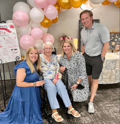 Group of people celebrating a milestone event indoors