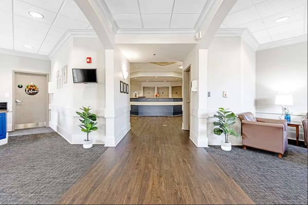 Bright interior lobby area with seating and reception