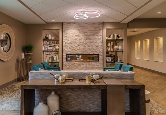 Elegant common area with modern decor and fireplace