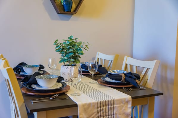 A beautifully set dining table in a senior living facility