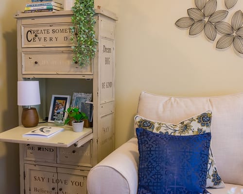 Cozy interior corner with a sofa and decorative elements