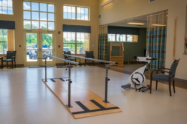 Physical therapy area with exercise equipment