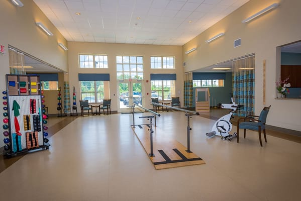 Bright therapy room with equipment and natural light