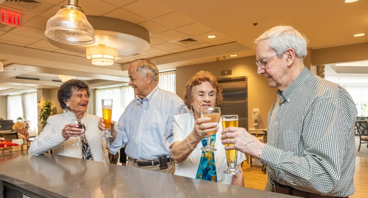 Residents enjoying drinks in a social setting