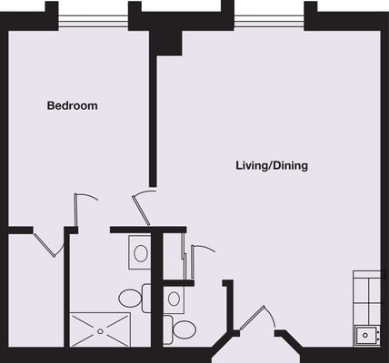 Architectural floor plan of a bedroom and living area