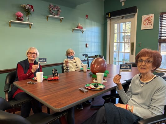 Residents enjoying snacks and activities in a common area