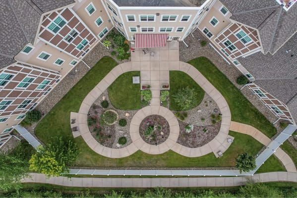 Aerial view of landscaped outdoor space with walking paths