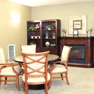 Cozy common area with a fireplace and seating