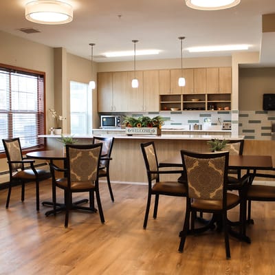 Bright dining area with tables and chairs