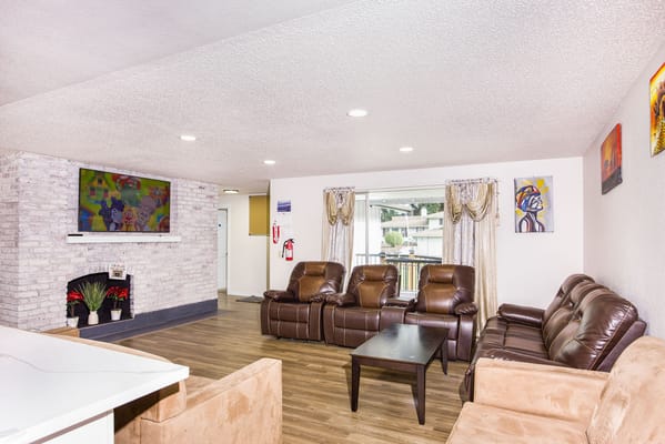 Cozy common area with comfortable seating and a TV