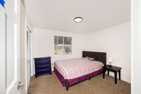 Private resident room with bed and furnishings