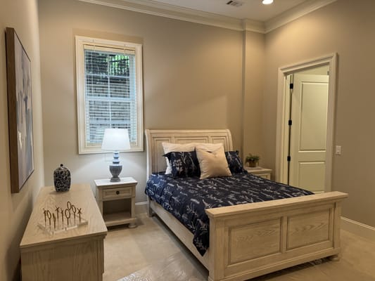 A cozy, well-decorated resident room with a bed and furniture