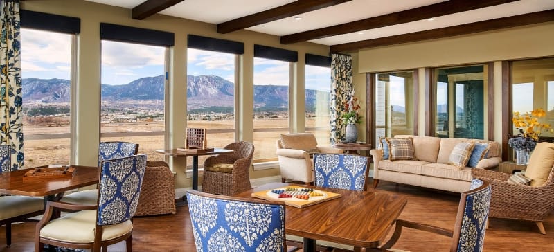 Bright common area with panoramic mountain views