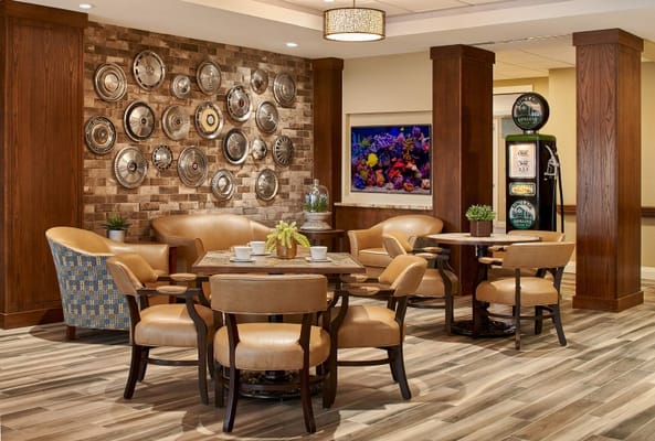 Bright common area with seating and decor