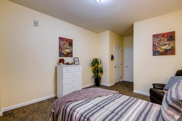 Cozy private room with a bed and decor