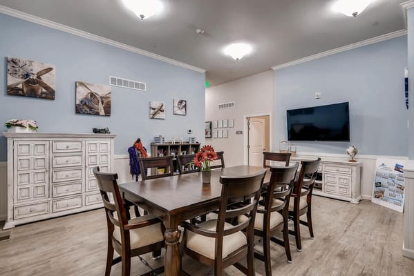 Bright common area with dining table and decor