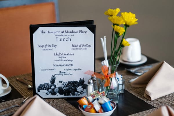 Lunch menu displayed on a dining table