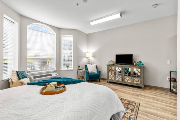 Bright and inviting resident room with modern decor