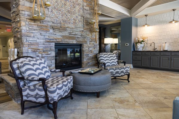 Interior seating area with a stone fireplace