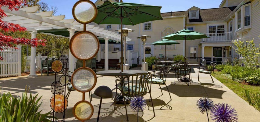 Outdoor seating area with umbrellas and decorations