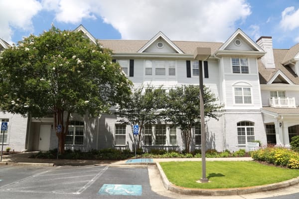 Exterior view of PruittPlace Buckhead with landscaping